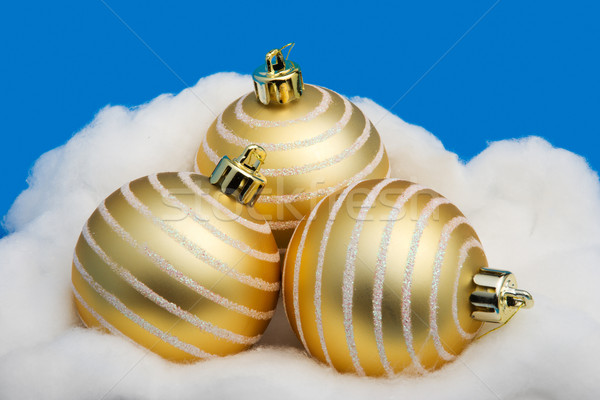 Three golden Christmas balls Stock photo © ErickN
