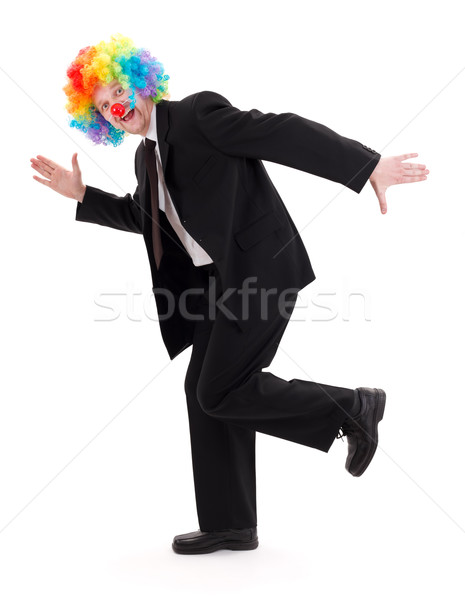 Stock photo: Happy business man with clown wig 