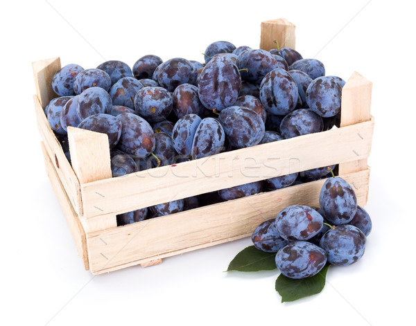 Plums (Prunus) in wooden crate Stock photo © erierika