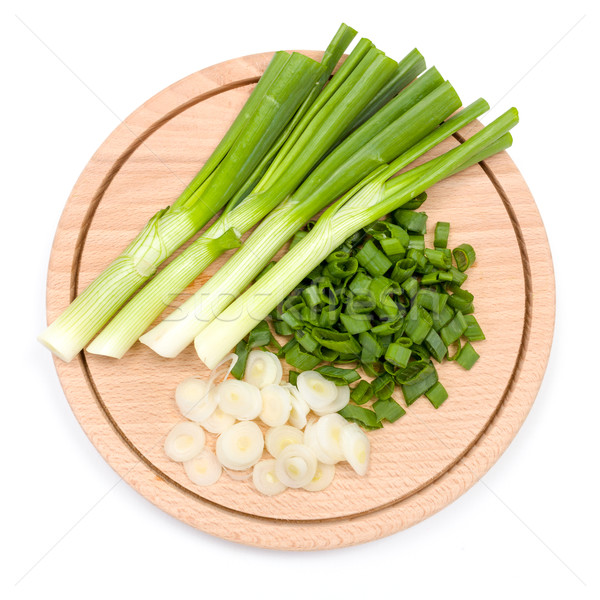 Freshly cut green onion on cutting board Stock photo © erierika