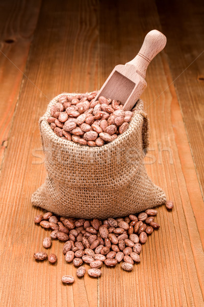 Pinto beans in burlap bag Stock photo © erierika