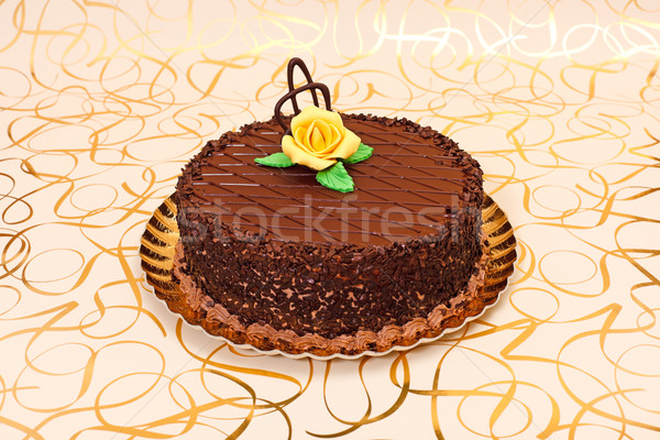 Csokoládés sütemény arany tányér narancs marcipán rózsa Stock fotó © erierika