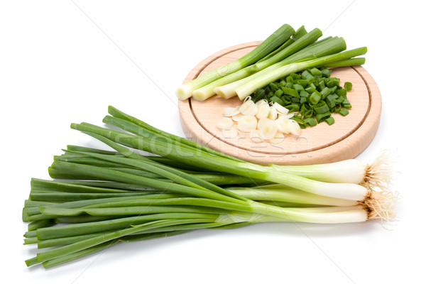 Freshly cut green onion on cutting board Stock photo © erierika