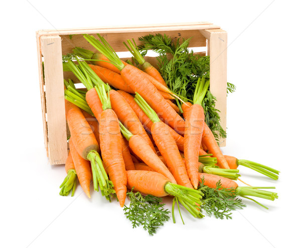 Carrot roots (Daucus carota ssp. sativus) in wooden crate Stock photo © erierika