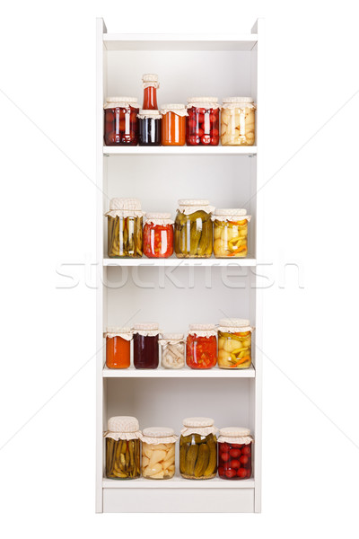 Stock photo: Shelf with various preserves