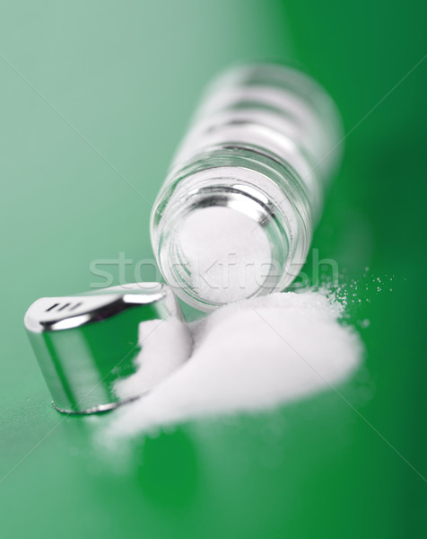 Spilled salt on green Stock photo © erierika