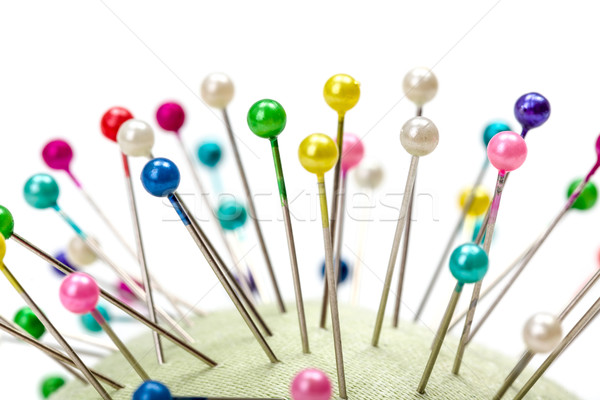 Pincushion full with colorful pins Stock photo © erierika