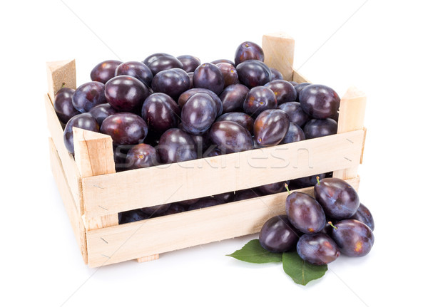 Plums (Prunus) in wooden crate Stock photo © erierika