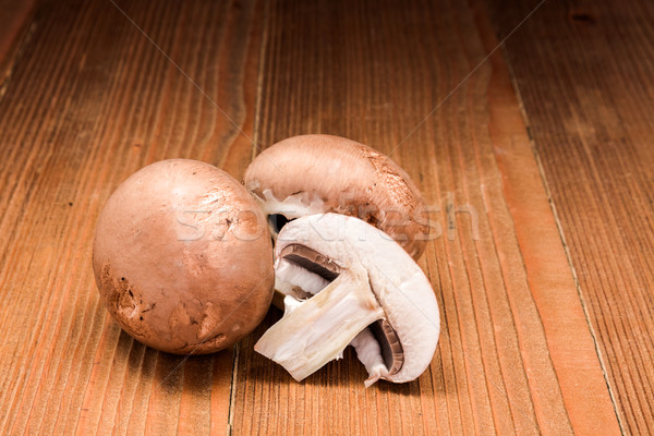 Barna megművelt gombák köteg fa deszka étel Stock fotó © erierika