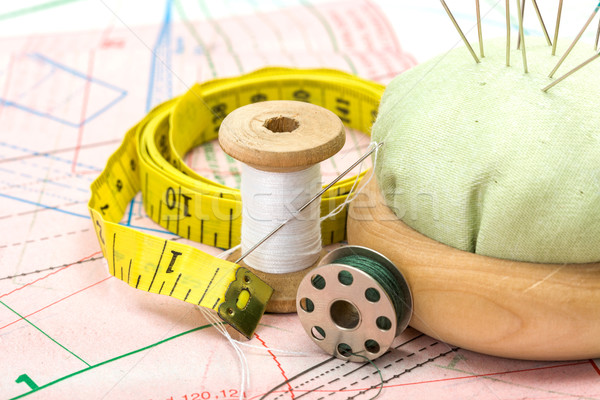 Stock photo: Sewing accessories on pattern cutting