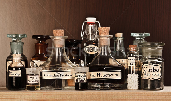 Különböző gyógyszertár üvegek homeopatikus gyógyszer sötét Stock fotó © erierika