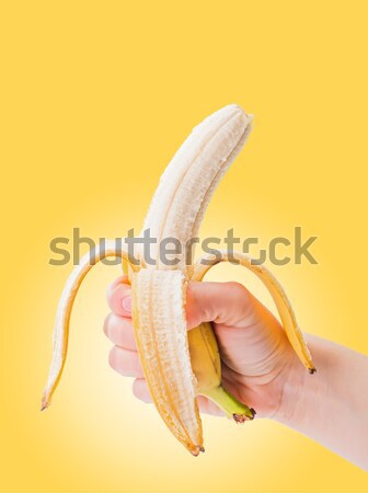 Hámozott banán kéz izolált érett fehér Stock fotó © erierika