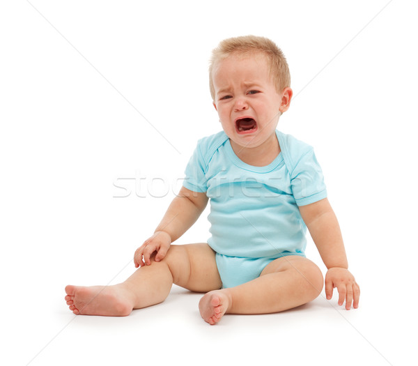 Płacz baby smutne chłopca posiedzenia niebieski Zdjęcia stock © erierika