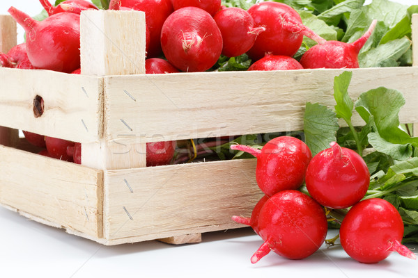 Macro of fresh red radish in crate Stock photo © erierika