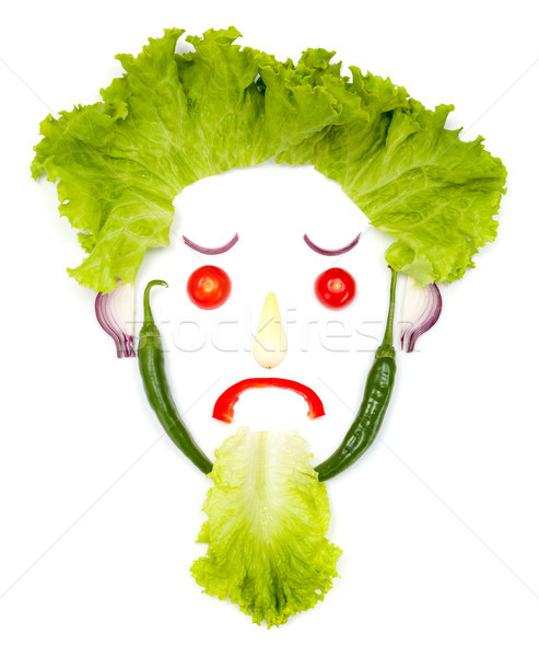 Sad human head made of vegetables Stock photo © erierika