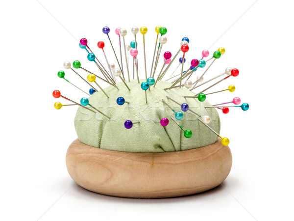 Pincushion full with colorful pins Stock photo © erierika