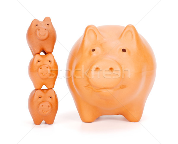 Small piggy banks superimposed near big one Stock photo © erierika