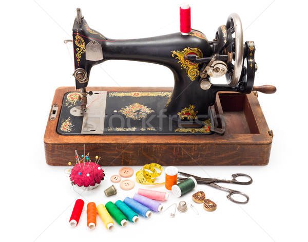 Old sewing machine and accessories Stock photo © erierika