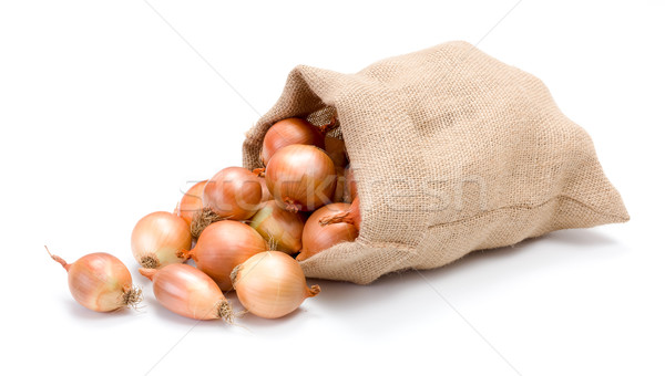 Yellow onions in burlap bag Stock photo © erierika