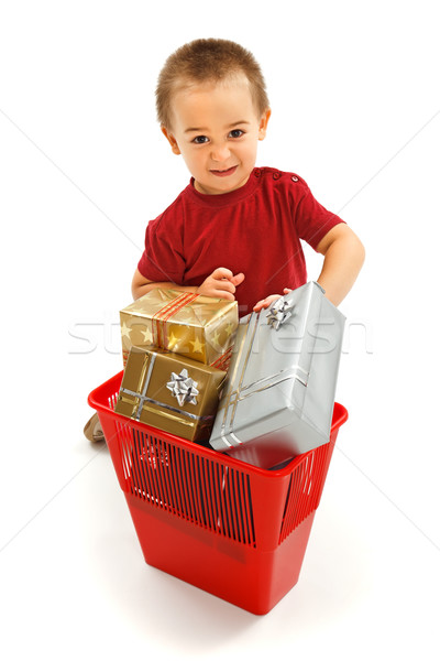 Little boy throwing presents in garbage bin Stock photo © erierika