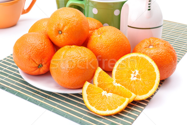 Appetizing oranges on plate Stock photo © erierika