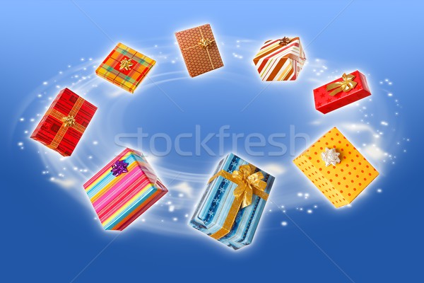 Wrapped presents rotating and flying around Stock photo © erierika