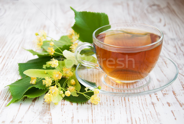 Csésze tea hárs virágok fából készült természet Stock fotó © Es75