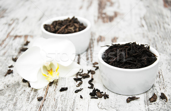 Black and green tea with orchid flower  Stock photo © Es75