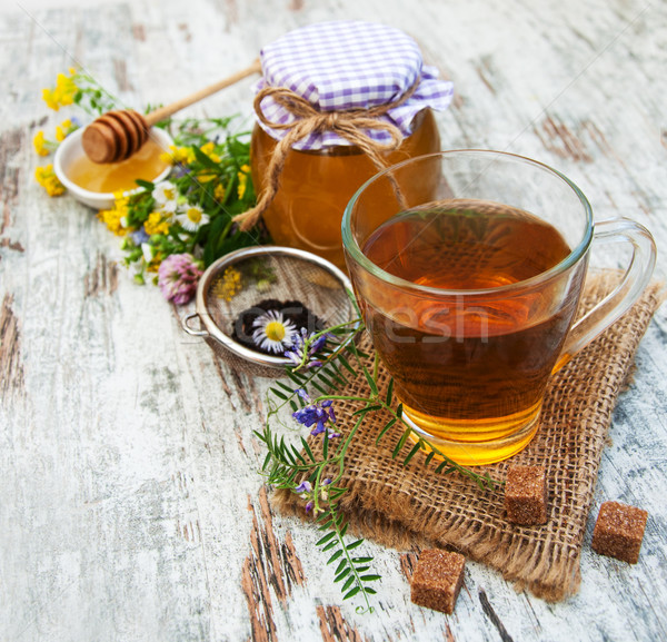 Tasse thé miel fleurs vieux bois [[stock_photo]] © Es75