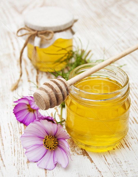 Honey with flowers Stock photo © Es75