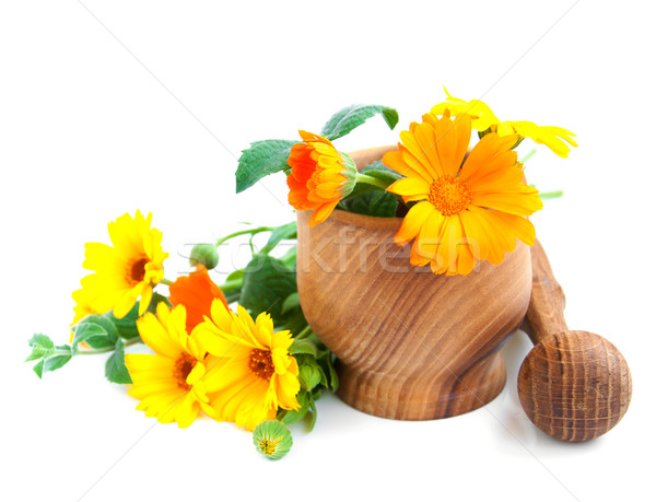 Calendula flowers and mortar Stock photo © Es75