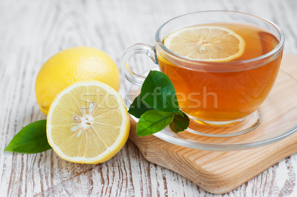 茶 レモンスライス 茶碗 レモン 木製のテーブル 葉 ストックフォト © Es75