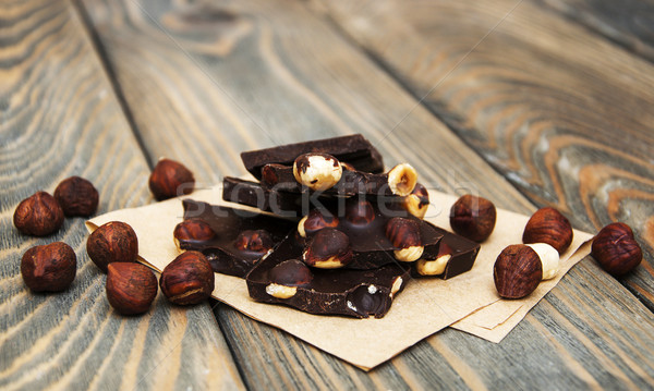 Zartbitter-Schokolade Nüsse Holz Essen Schokolade Hintergrund Stock foto © Es75