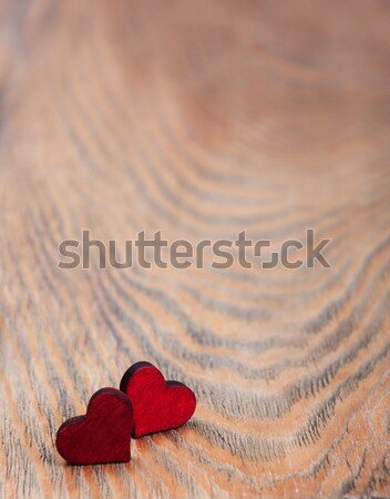 Hearts on a wooden background - vintage toning Stock photo © Es75