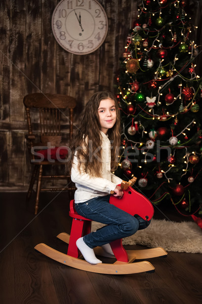 girl on a toy horse Stock photo © Es75