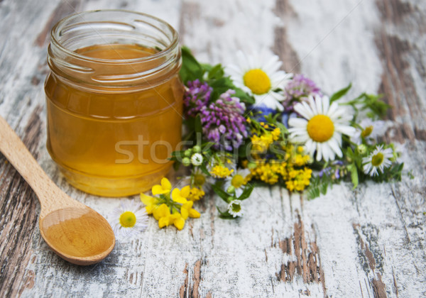Méz vad virágok öreg fából készült étel fa Stock fotó © Es75