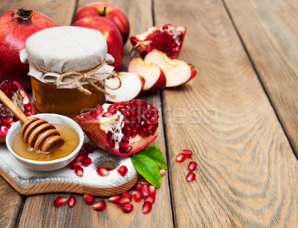Honing granaatappel appels oude houten voedsel Stockfoto © Es75