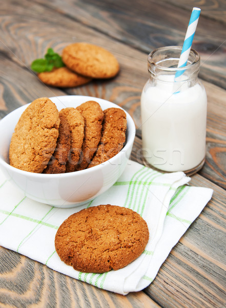 Milk and oatmeal cookies Stock photo © Es75