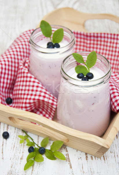 Fruto iogurte frutas frescas mirtilos vidro jarra Foto stock © Es75