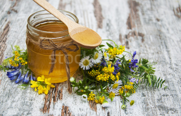 Miele fiori di campo vecchio legno alimentare legno Foto d'archivio © Es75