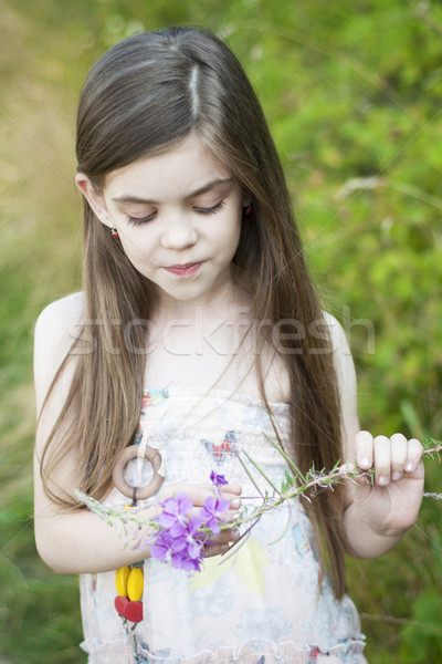 Girl with a flower Stock photo © Es75