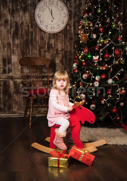 little girl on a toy horse Stock photo © Es75