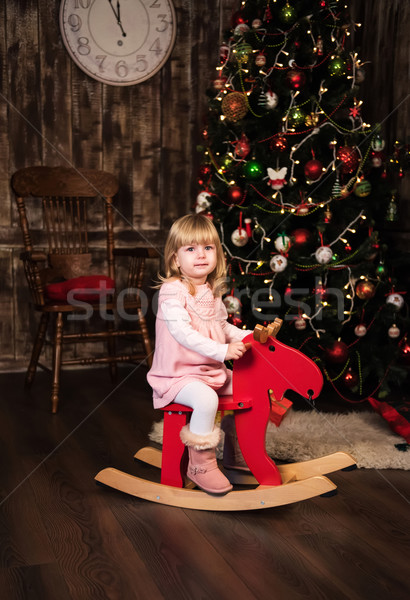 little girl on a toy horse Stock photo © Es75