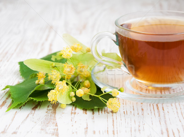 Csésze tea hárs virágok fából készült természet Stock fotó © Es75