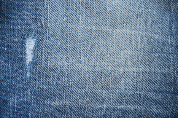 джинсовой синий текстуры темно джинсов дыра Сток-фото © Es75