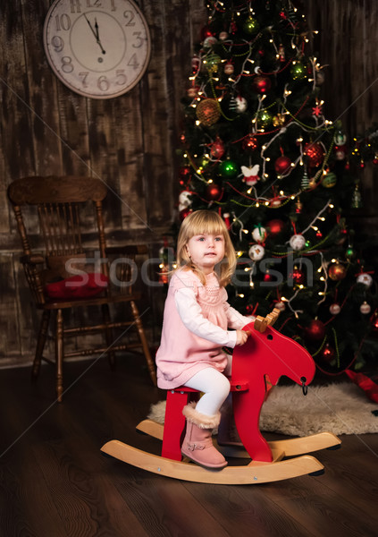 little girl on a toy horse Stock photo © Es75