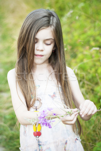 Girl with a flower Stock photo © Es75