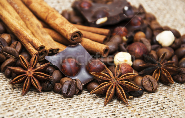Coffee beans with cinnamon sticks and chocolate Stock photo © Es75