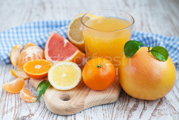 Citrus vruchten vers sinaasappelsap variatie bladeren Stockfoto © Es75
