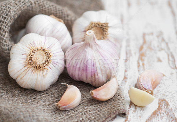 Sackleinen Sack Knoblauch Holz Pfeffer Hintergrund Stock foto © Es75